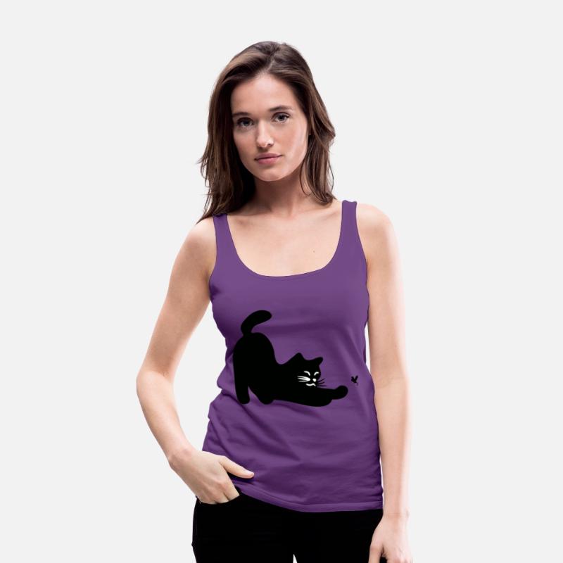 a cat playing with a dragonfly