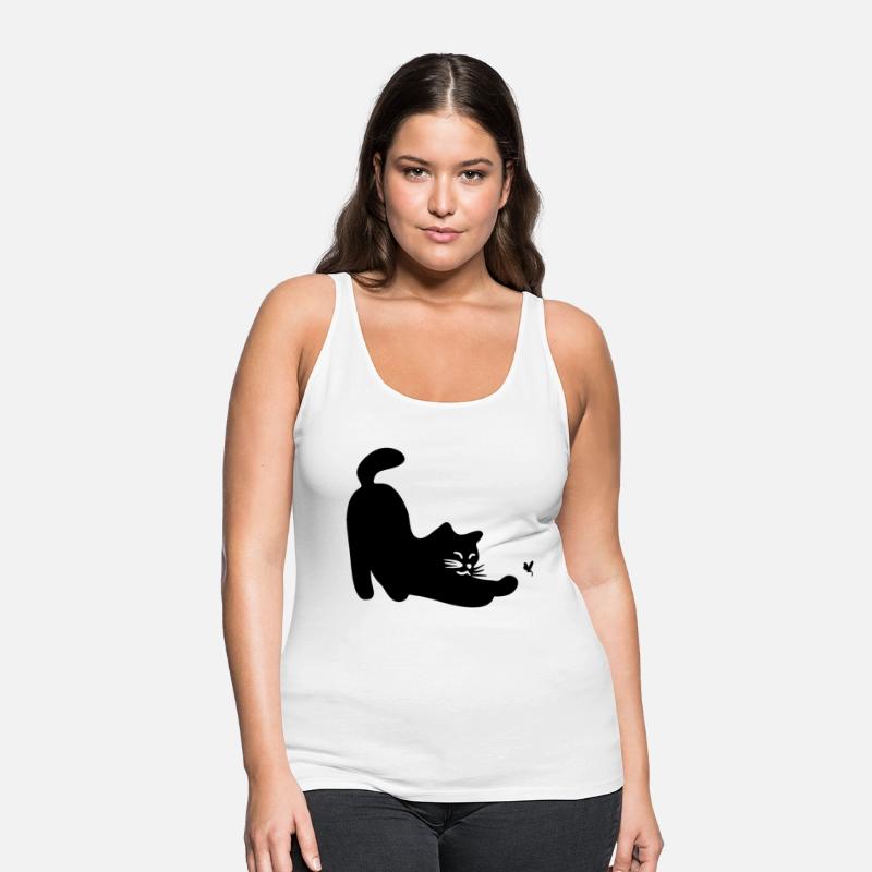 a cat playing with a dragonfly