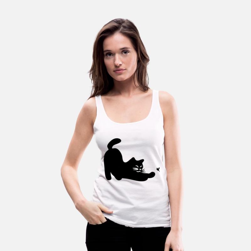 a cat playing with a dragonfly