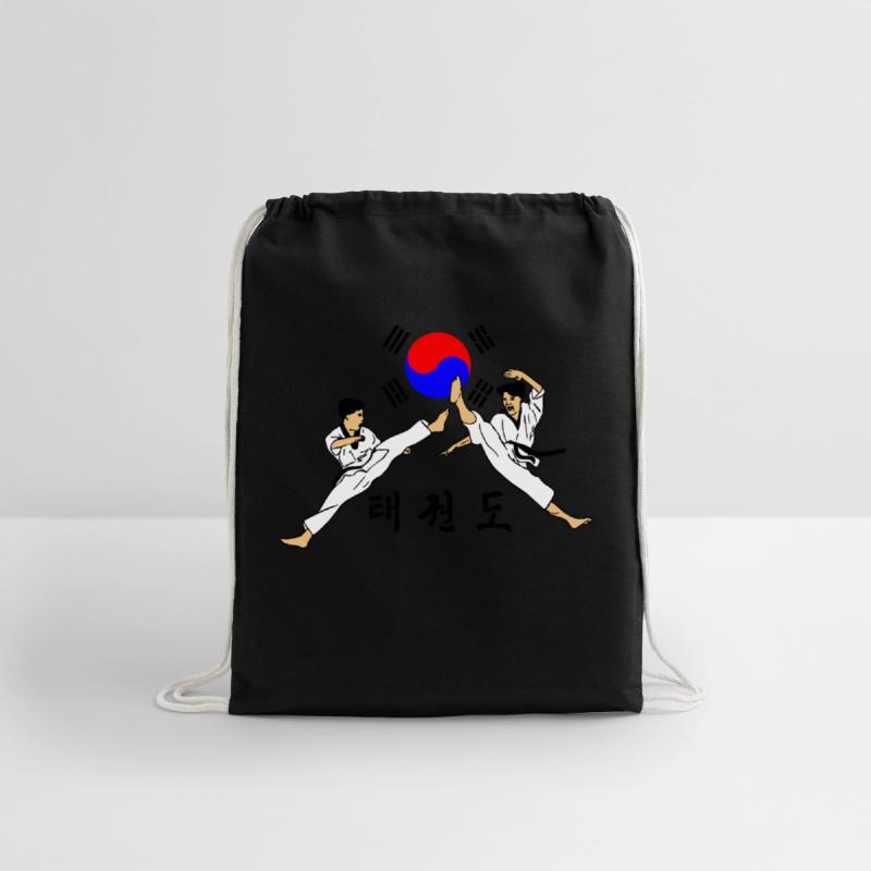 Two young taekwondo boys with jumped kick